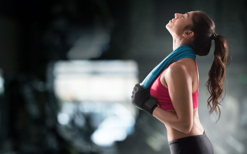 gym-protein-powder-woman-after-gym-workout-min