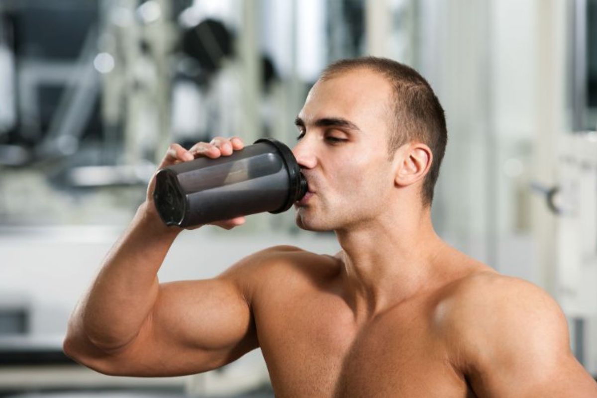 best-whey-protein-south-africa-man-drinking-protein-shake-in-gym-min